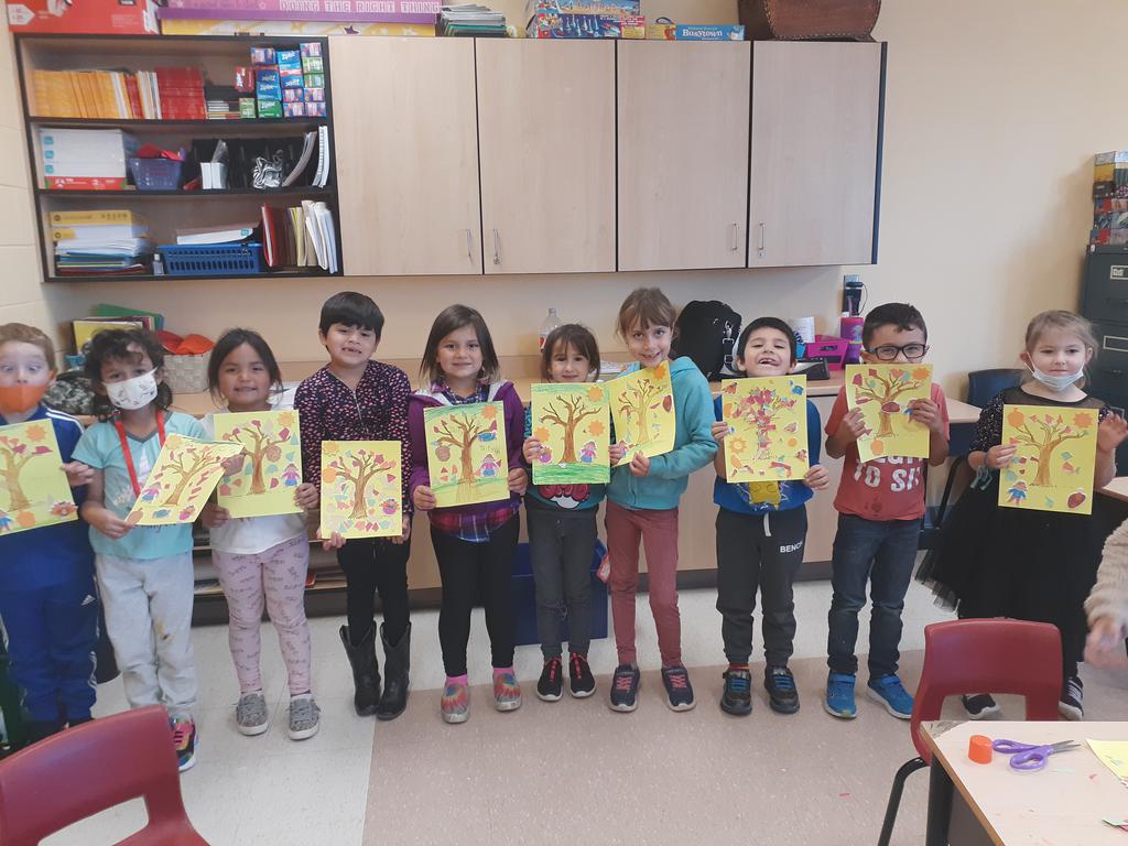 Grade one proudly displaying their fall artwork